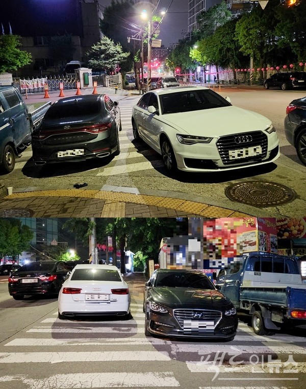 아우디와 국산차 세단이 성남중원경찰서 앞 사거리 인근 인도 횡단보도를 밤새 막았다. 이곳은 노인보호구역이다. [사진=정수남 기자]